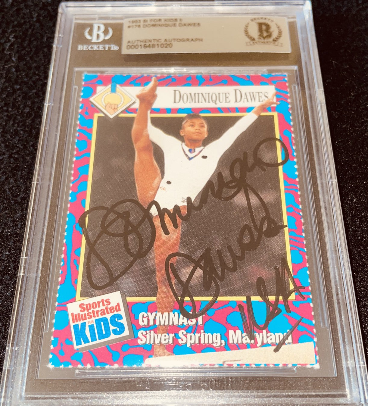 Dominique Dawes autographed 1993 Sports Illustrated for Kids Rookie Card BAS slabbed