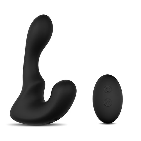 A black silicone dual-action vibrator alongside a remote control for operation.