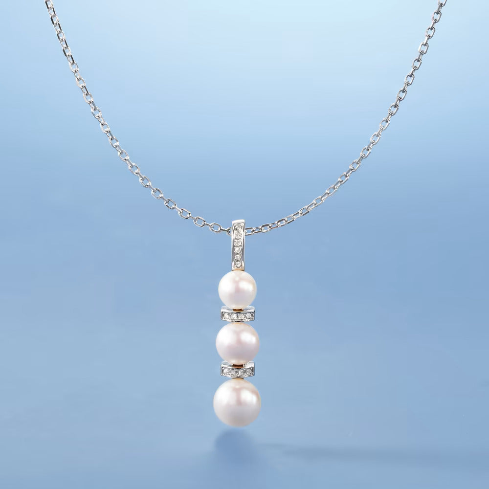 6-8.5mm Cultured Pearl and .10 ct. t.w. Diamond Pendant Necklace in Sterling Silver. 18