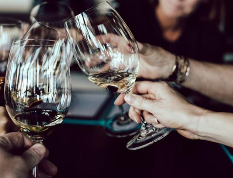 holding-wine-glasses