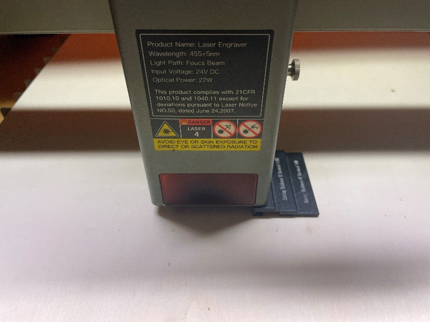 adjust the focus of the laser module