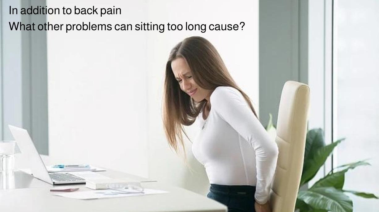 In addition to back pain What other problems can sitting too long cause?