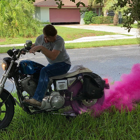 gender reveal tires pink smoke