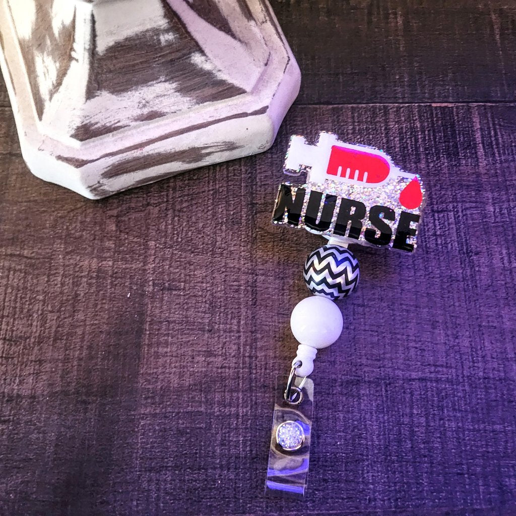 Syringe nurse badge reel