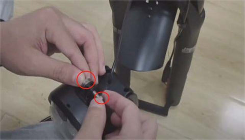 1. Loosen the bolts on the headlights with a PH1 wrench