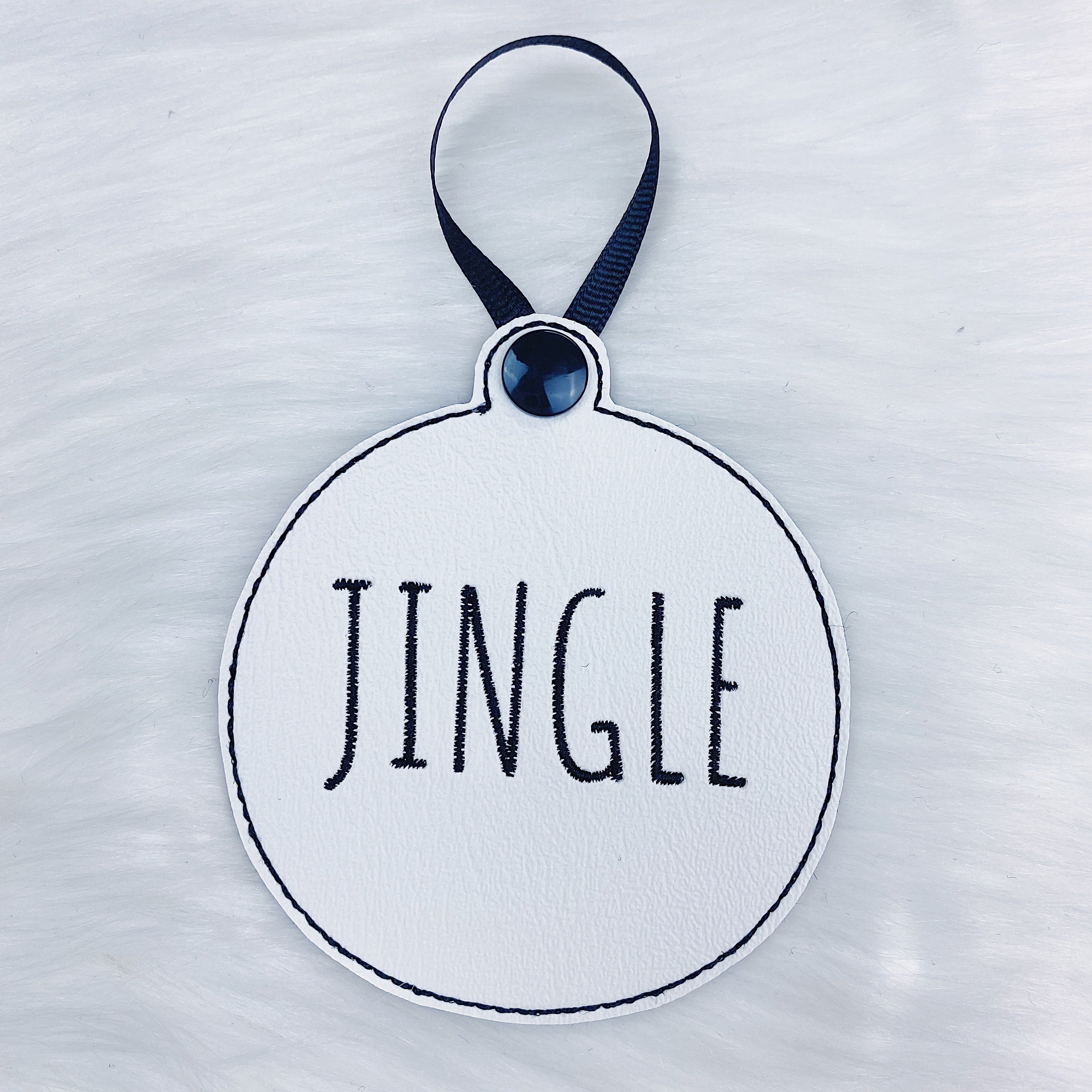 Merry, Noel, + Jingle White Vegan Leather (Black Stitching) Embroidered Ornaments | Set of 3