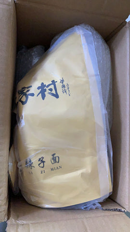 亮亮妈转运到英国的牛皮纸袋包装的袁家村辣椒面的实拍照片