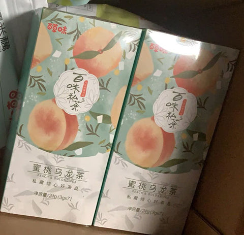 亮亮妈转运到英国的百草味蜜桃乌龙茶的照片