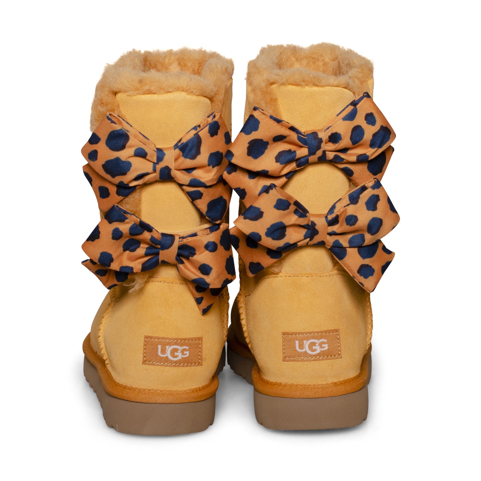 Yellow uggs with deals bows