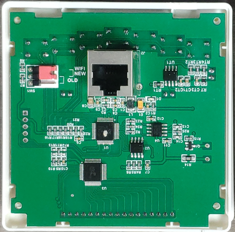 Series 2 close up of AlorAir Remote Control. Its a circuit board with electronic components, including an Ethernet port labeled "WIFI NEW" and "OLD."