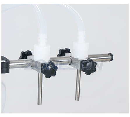 A félautomata dupla fej töltőgép töltőfúvógépe