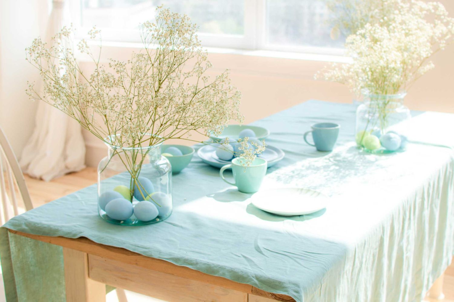 blue tablecloth with blue eggs