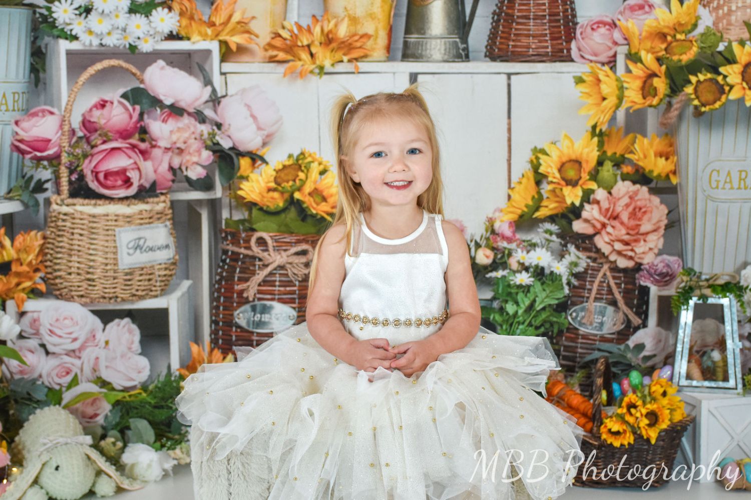 little girl's photo with sunflowers