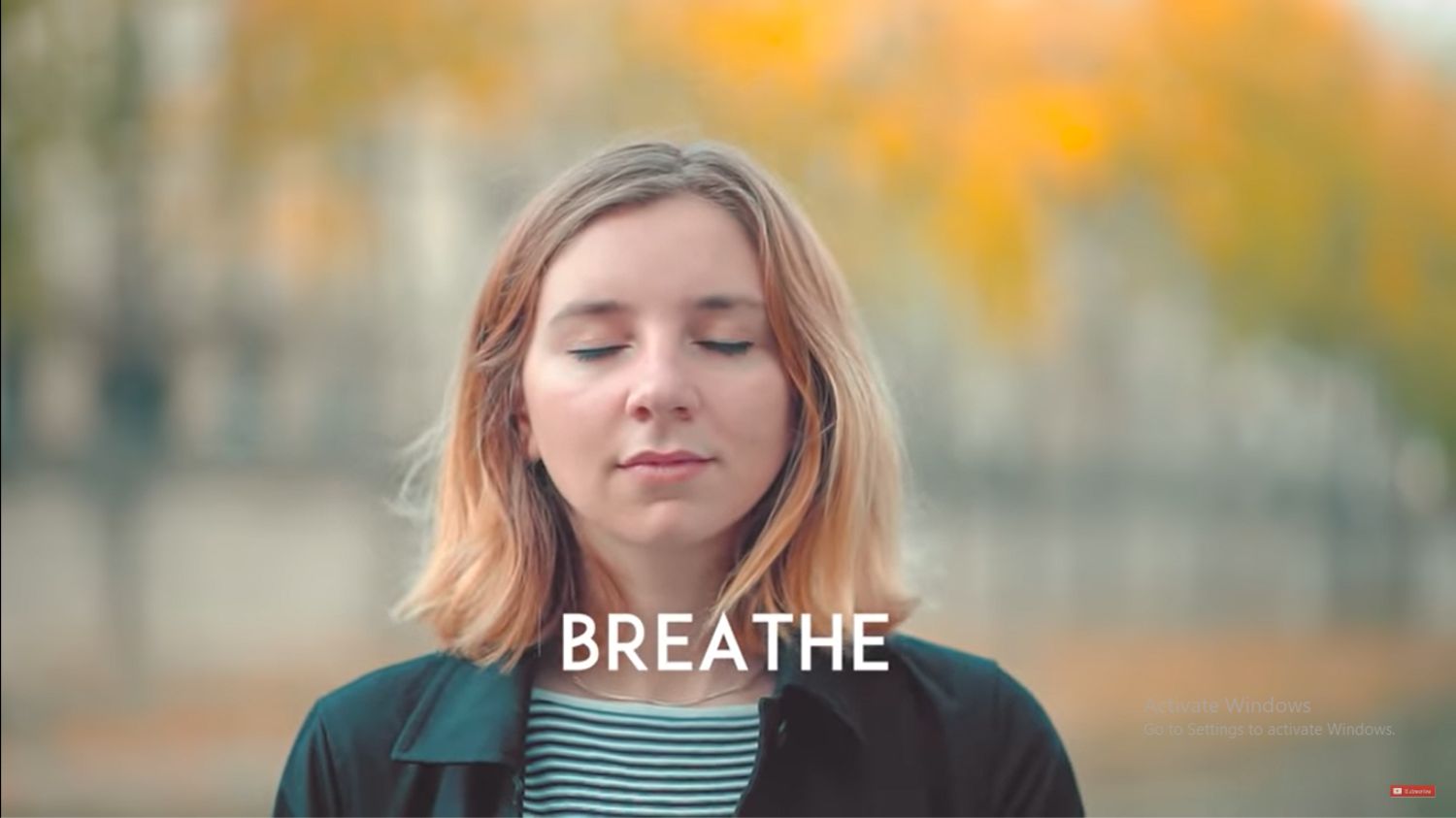 a female breathing for natural smile
