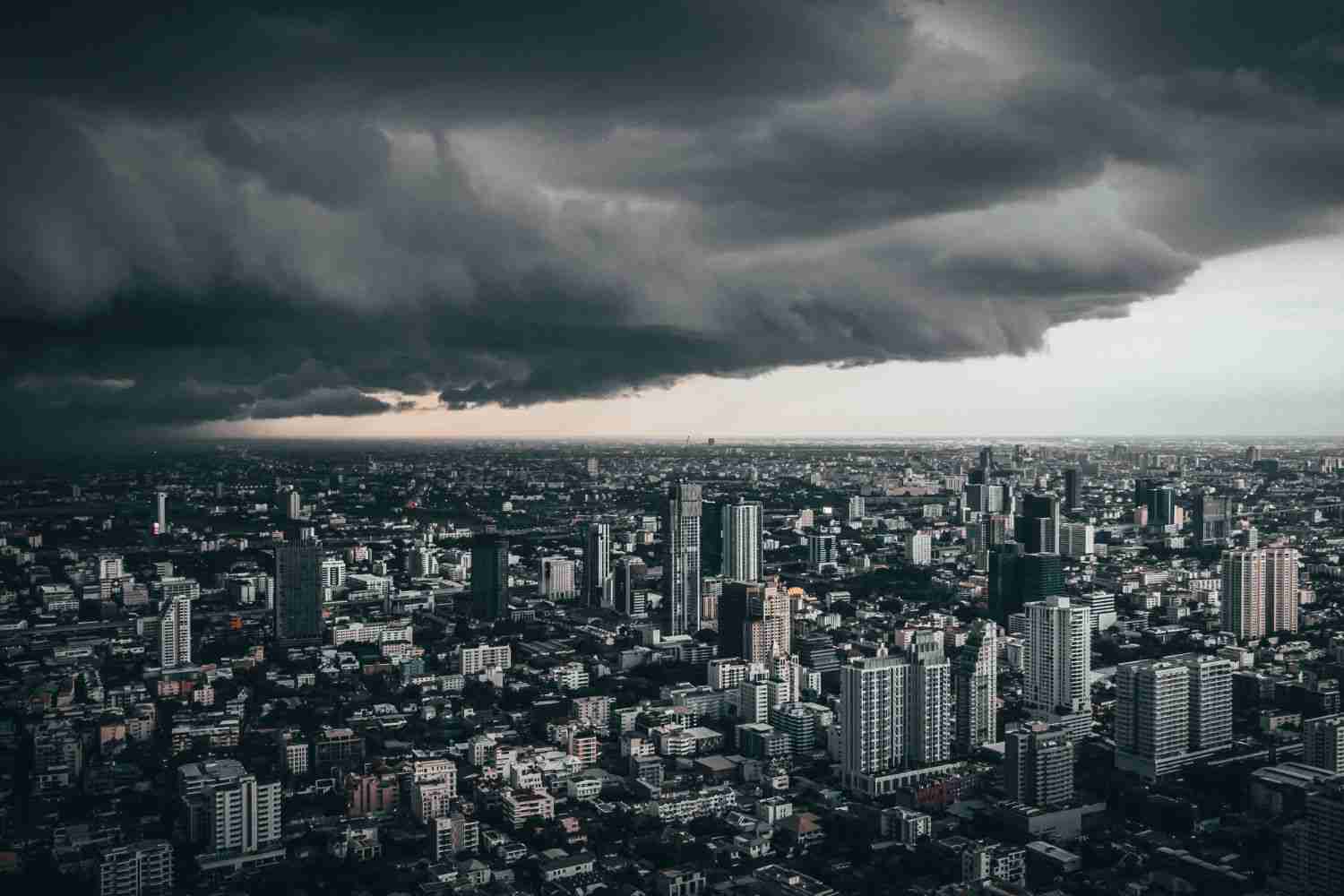 Dark clouds spread throughout the city