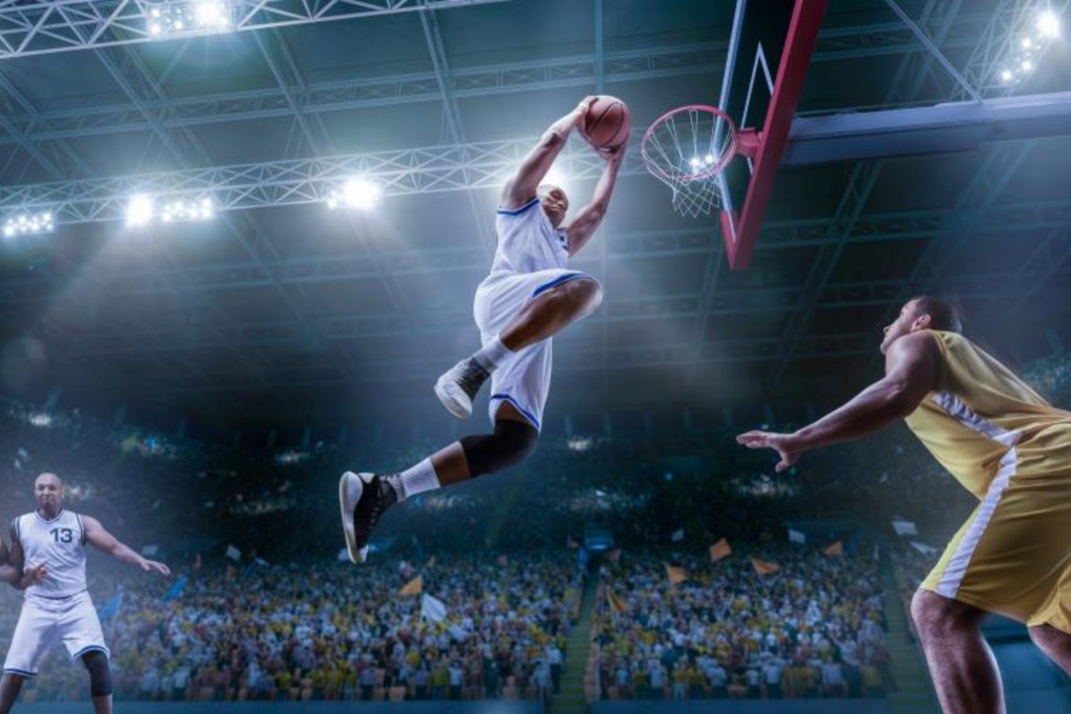basketball player jumping high and shooting ball 