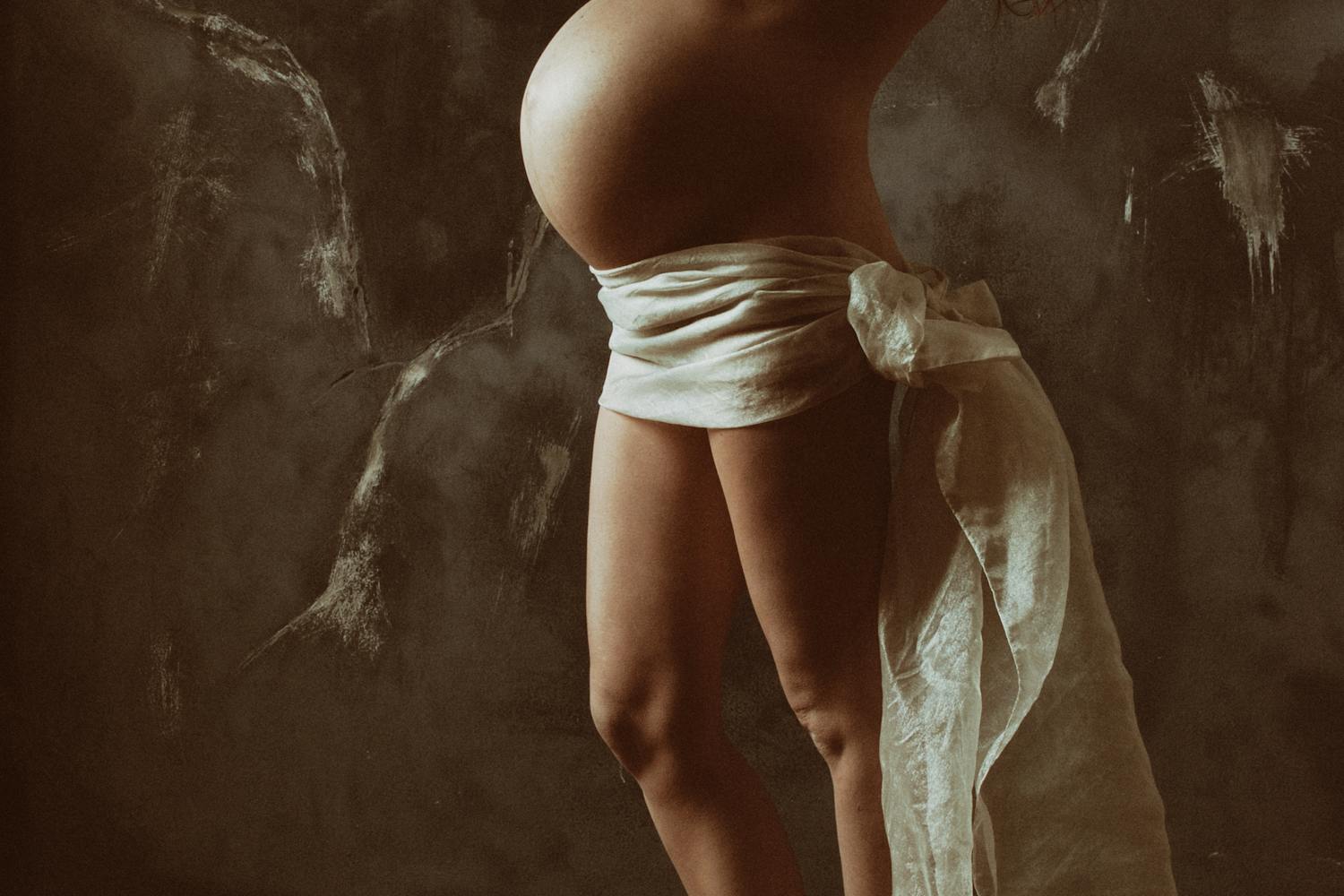 vrouwen vorm voor de zwangerschapsfotografie van een vrouw