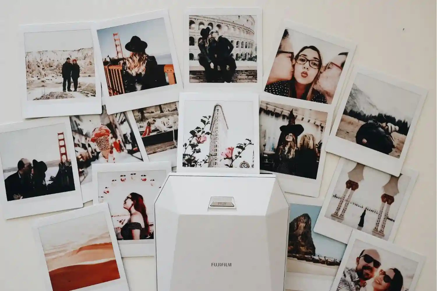 some Polaroid photos and a printer