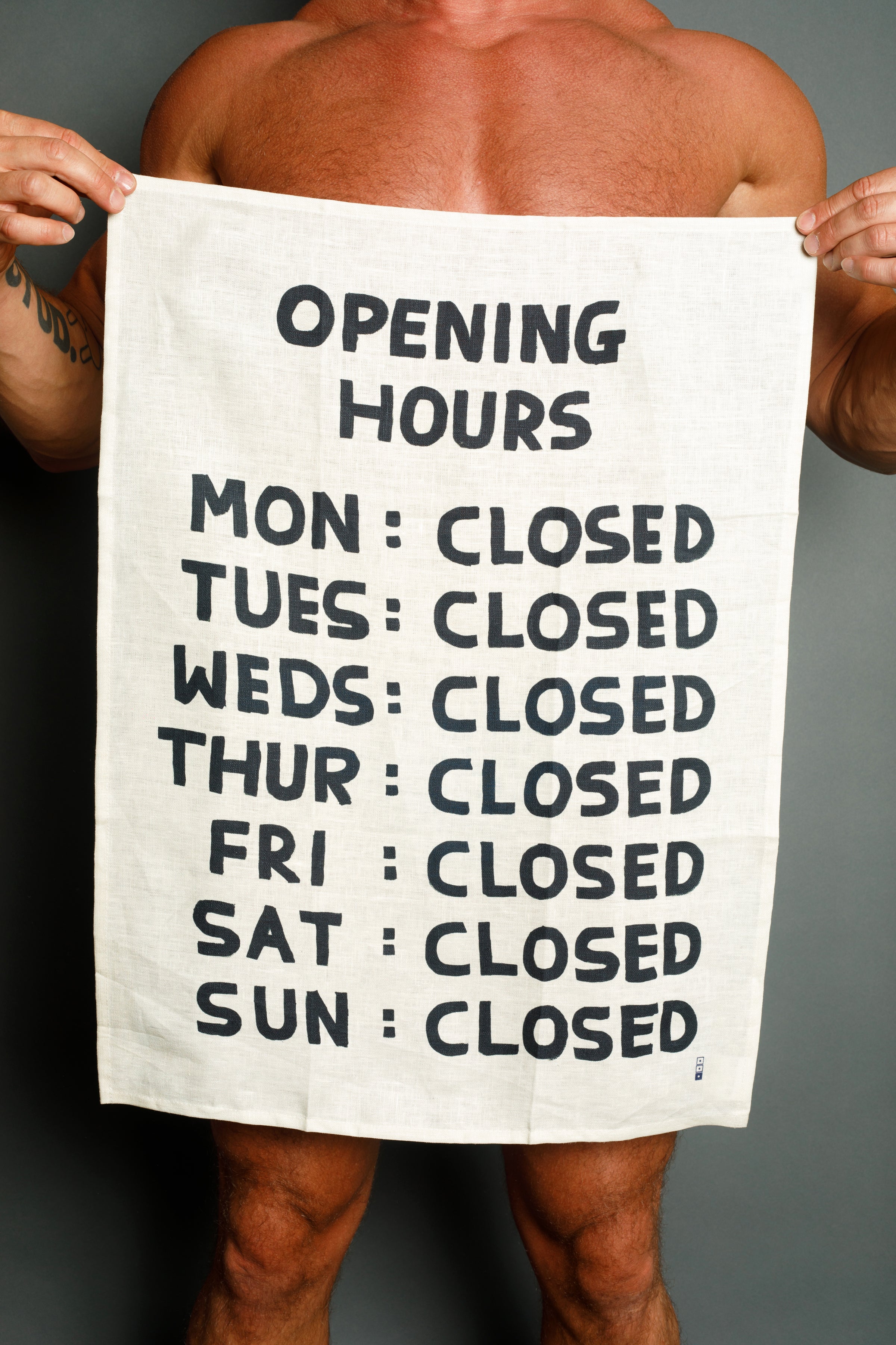 Opening Hours Tea Towel - Third Drawer Down X David Shrigley