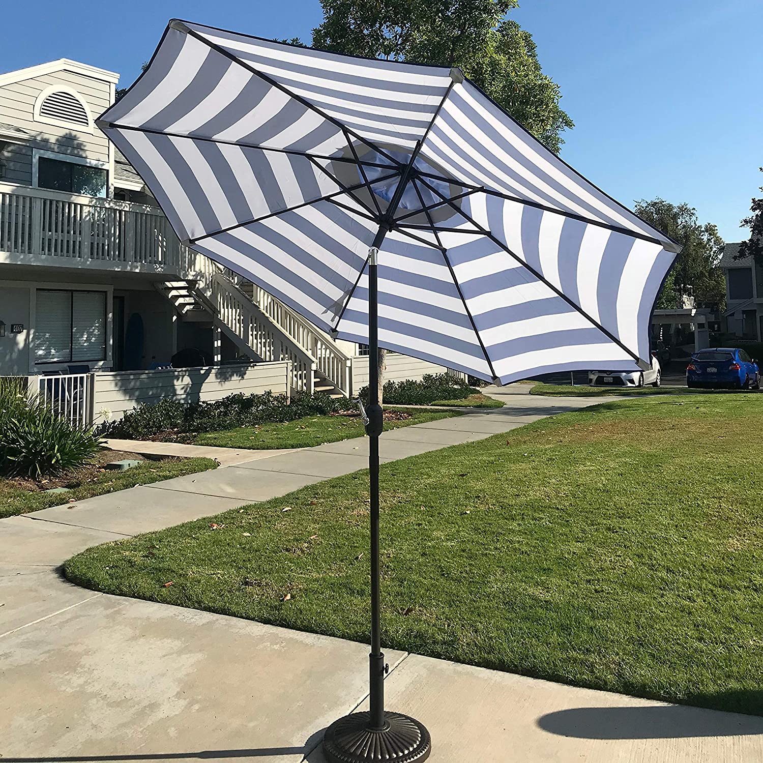 Unknown1 9 Feet Blue/White Strip Patio Umbrella Tilt Crank Blue White Stripe Market Modern Contemporary Round Polyester Steel Lift