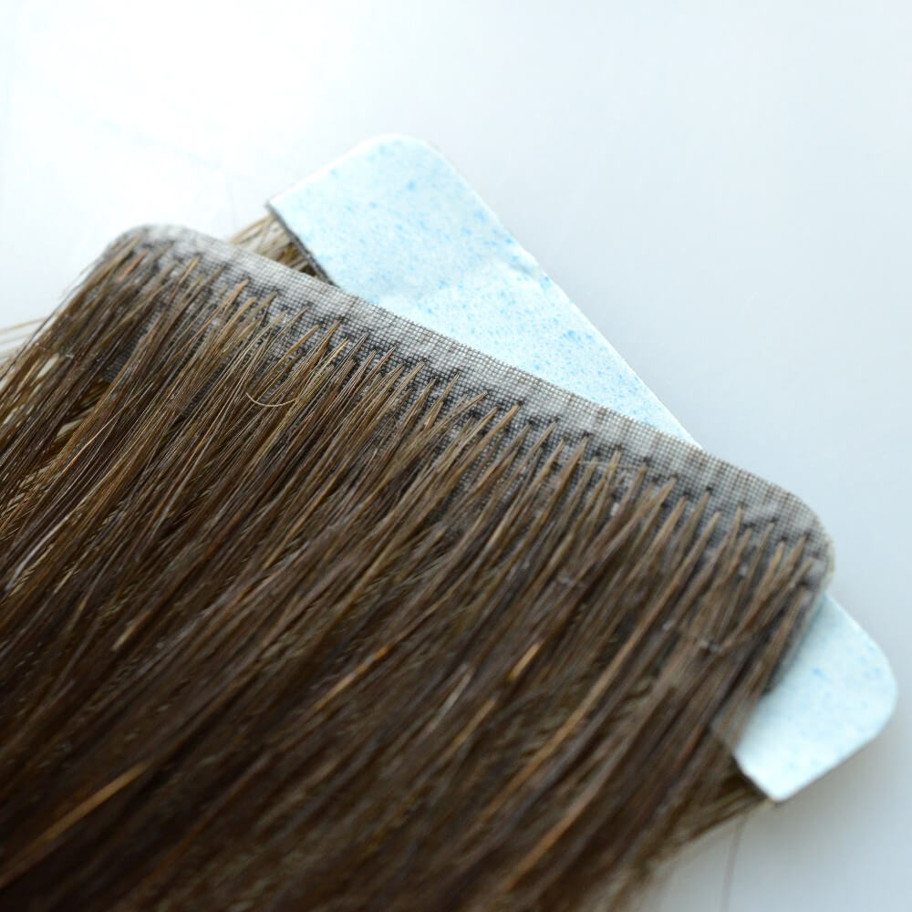 Injection tape in hair extensions