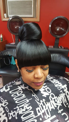 Full High Buns With Bangs for Black Women
