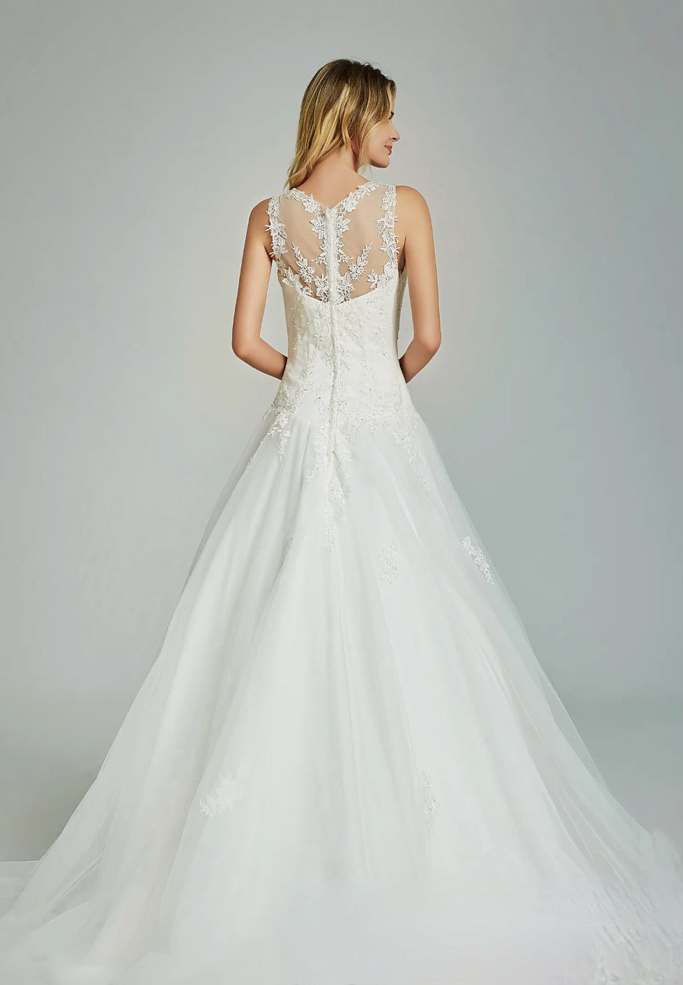 Elegant A-Line Sheer Back Bridal Gown With Appliques