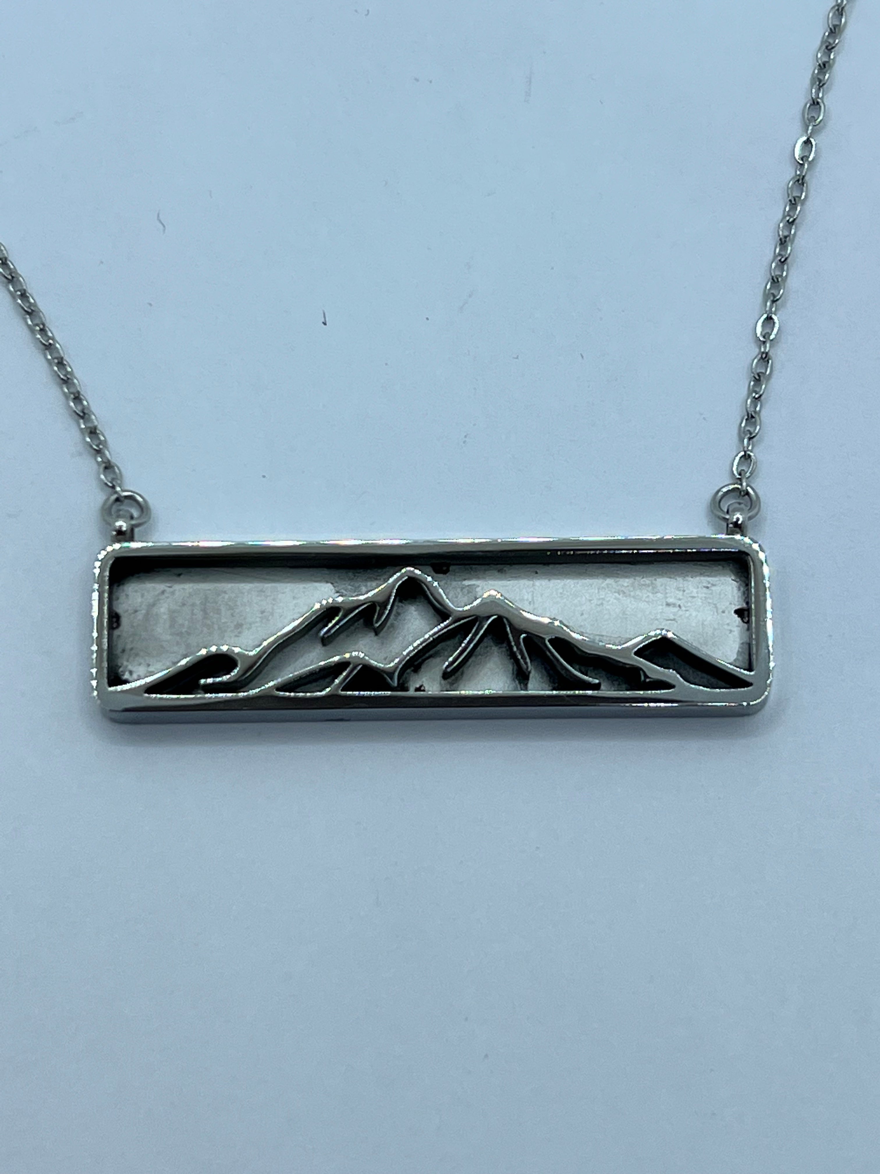 Stainless steel Pendants and Earrings, Mountain, Ocean designs