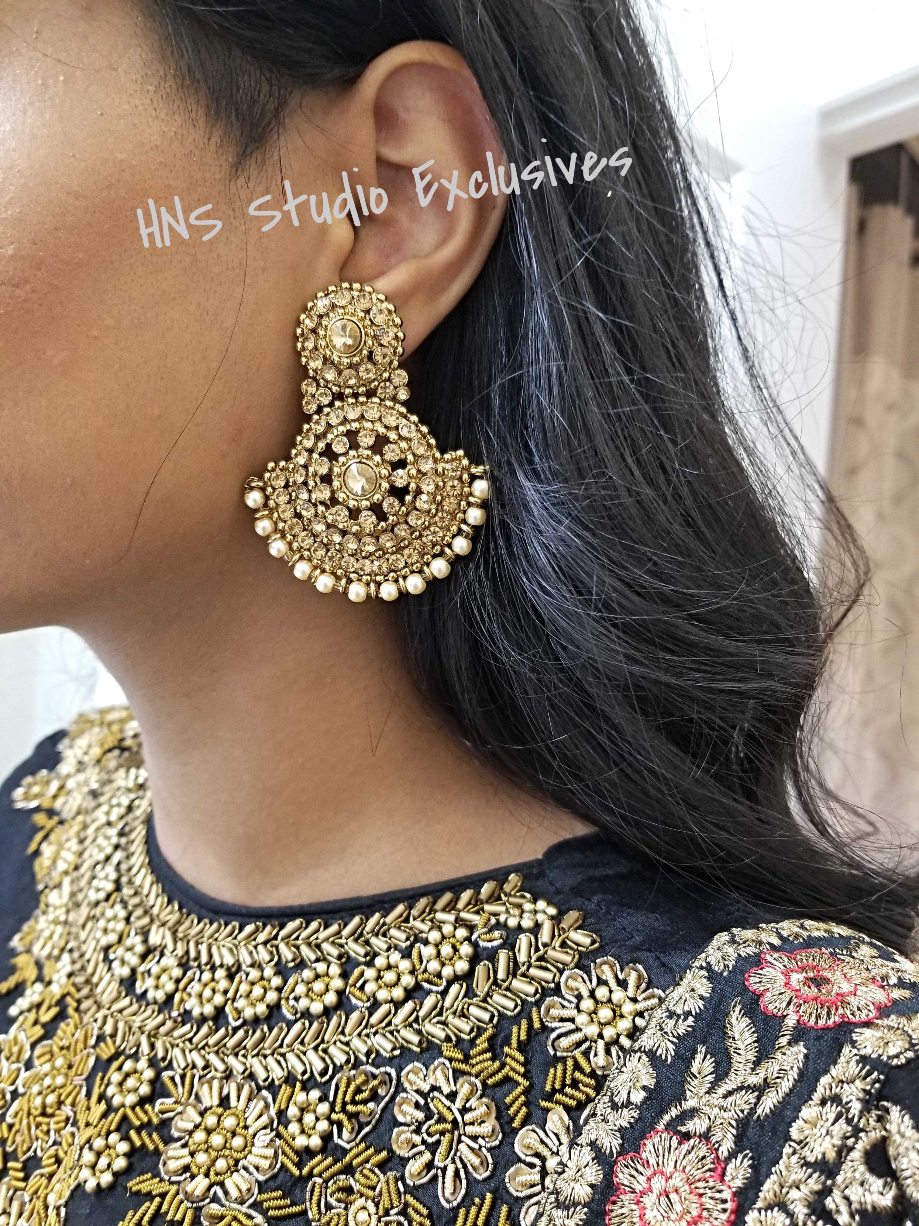 Exquisite Earrings and Tikka Set Adorned With Champagne Pearls
