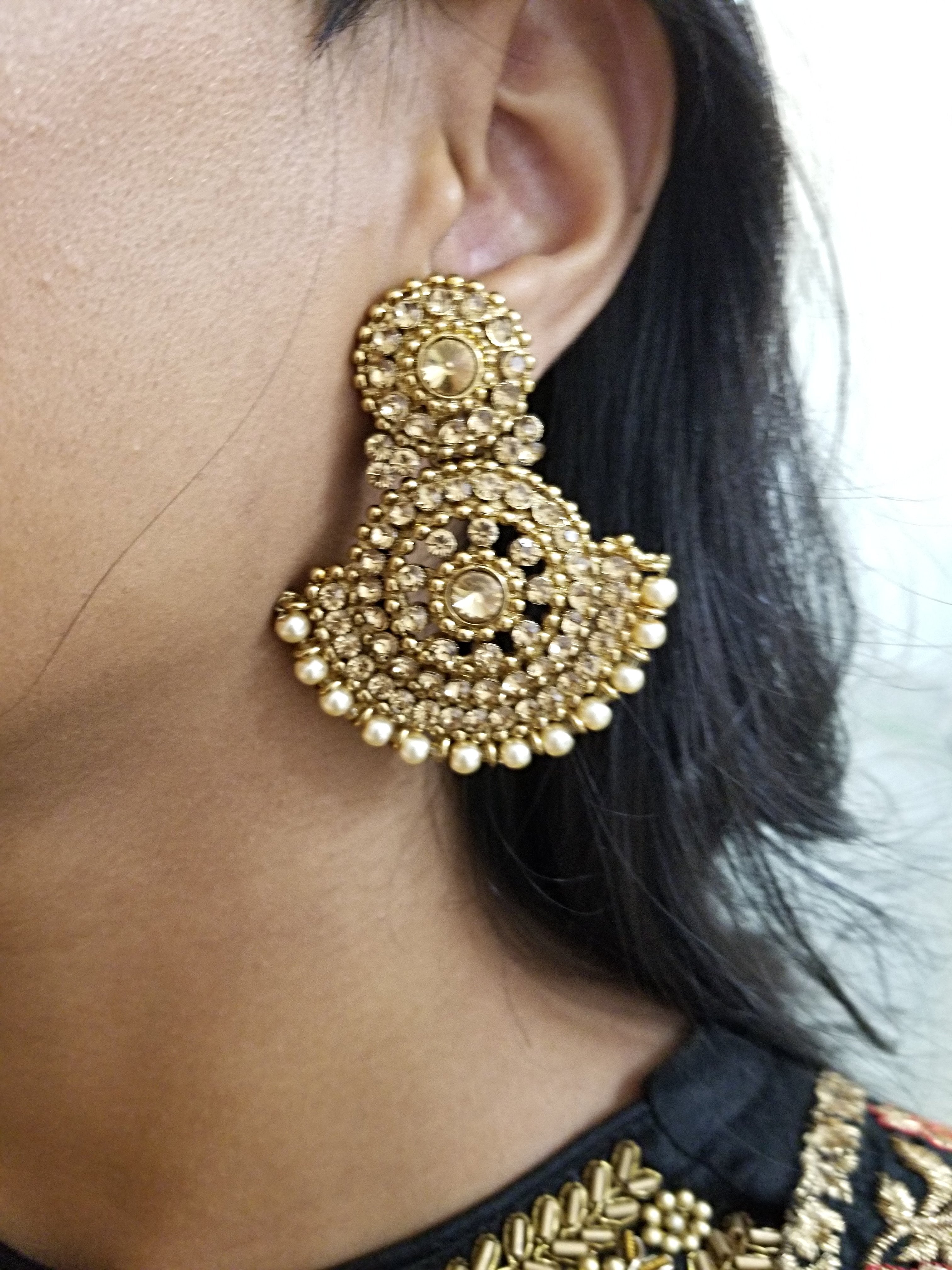 Exquisite Earrings and Tikka Set Adorned With Champagne Pearls