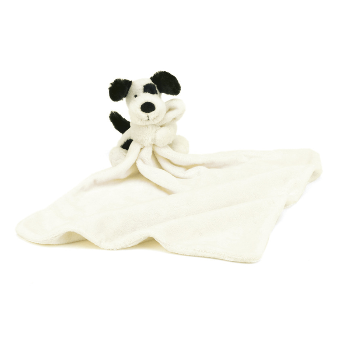 bashful black and cream puppy soother