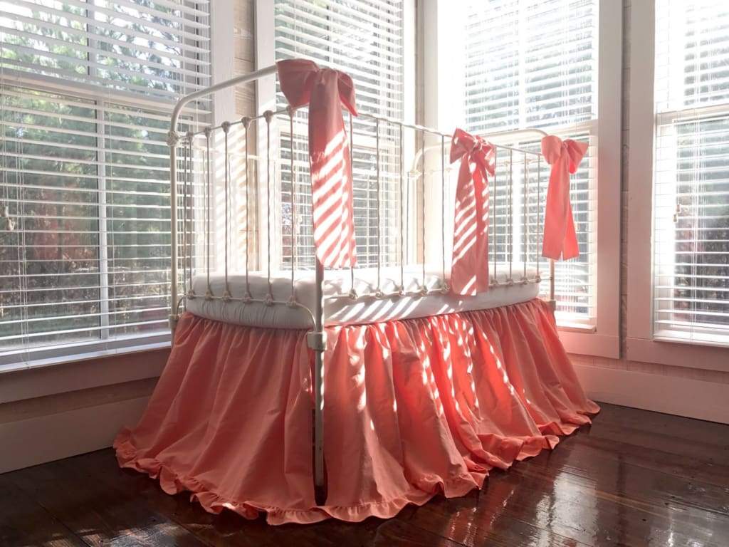 Coral Ruffled Crib Skirt and Large Crib Bows