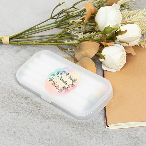 Wrap Mother's Day gifts with personalized stickers and flowers.
