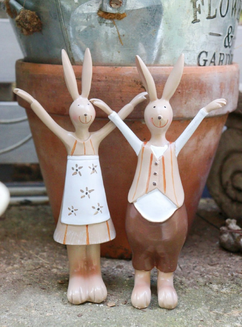 Material: Resin Note: Rabbit father and mother are connected together Two rabbit children are seperated