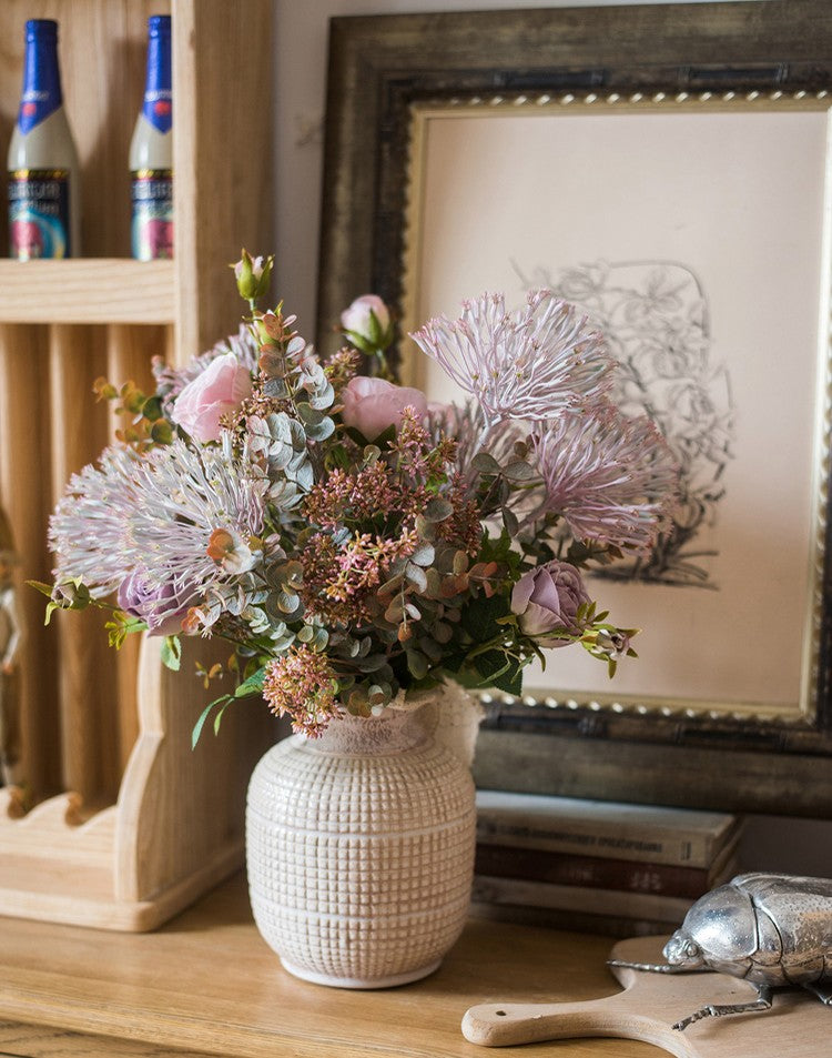 Modern Artificial Flowers for Home Decoration. Rose Flowers. Eucalyptus Globulus. Holly Leaf. Spring Flower Arrangement for Living Room
