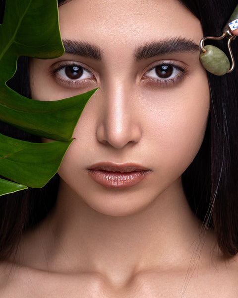 a girl with straight eyebrows by brushing brow hairs upwards