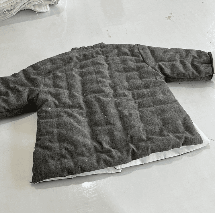 Dark grey padded tang suit for children