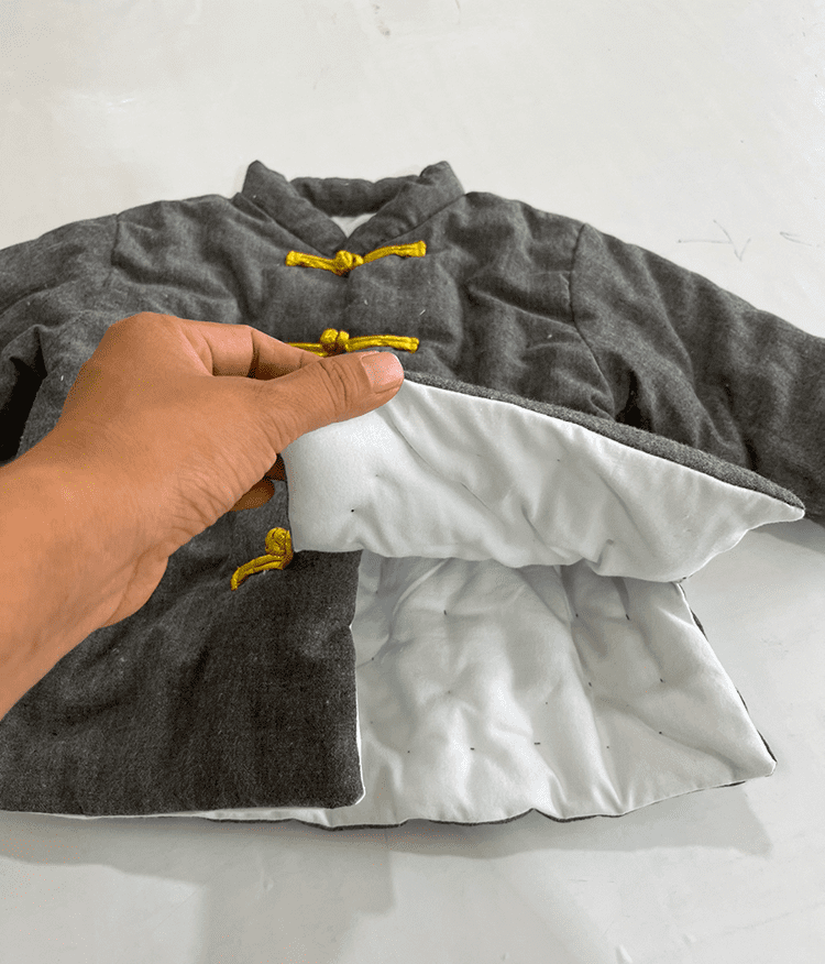 Dark grey padded tang suit for children