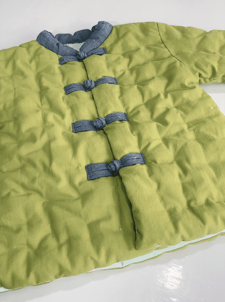 Green padded tang suit for children