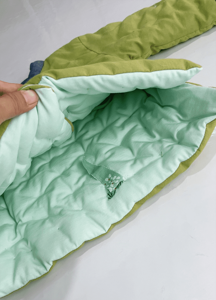 Green padded tang suit for children