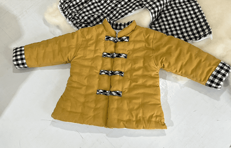 Yellow padded tang suit for children