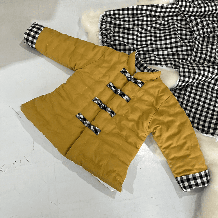 Yellow padded tang suit for children